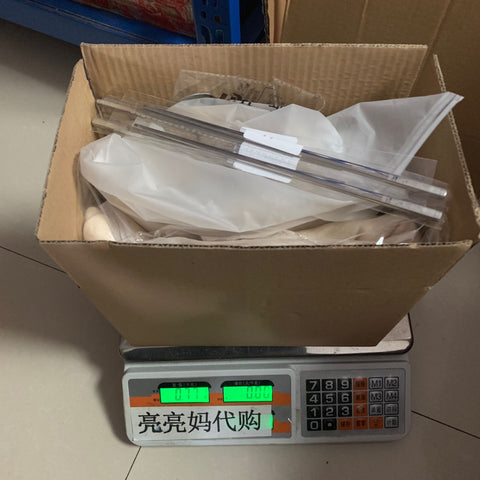 亮亮妈转运到英国的筷子围巾包裹的重量照片