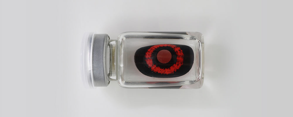 Black and red 22mm sclera contact lenses which entirely cover the sclera and iris