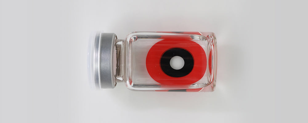 Red and black 22mm sclera contact lenses which entirely cover the sclera and iris turning the whole eye red