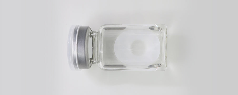 All white 22mm sclera contact lenses which entirely cover the sclera and iris