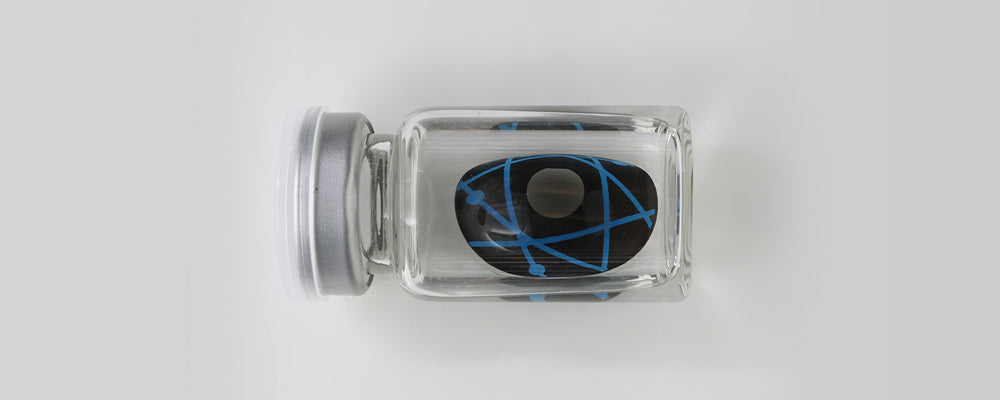 Black and blue 22mm sclera contacts which entirely cover the sclera and iris
