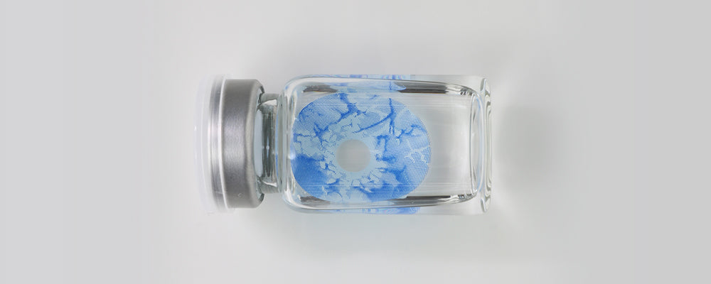 Blue and white 22mm sclera contact lenses which entirely cover the sclera and iris