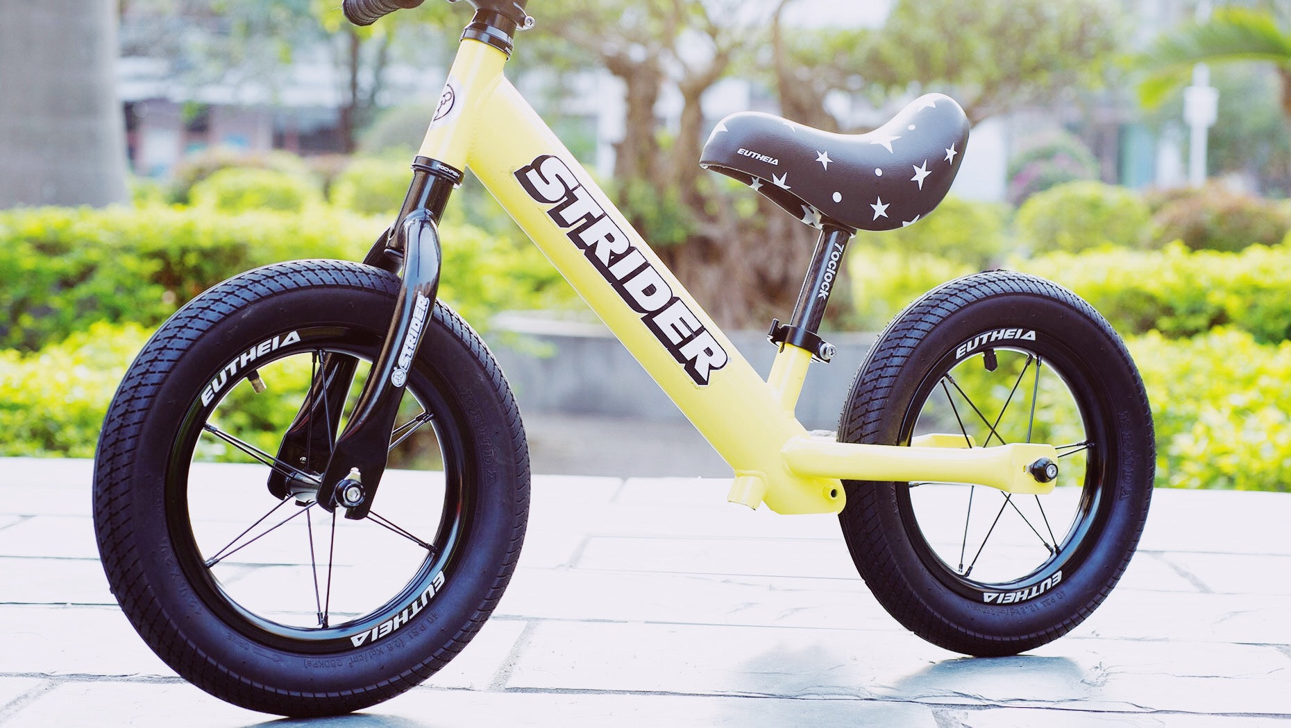 yellow strider balance bike