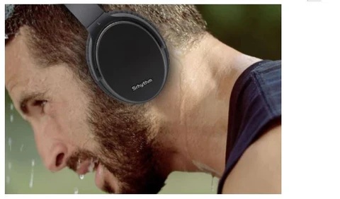 Man wearing Srhythm ANC headphones