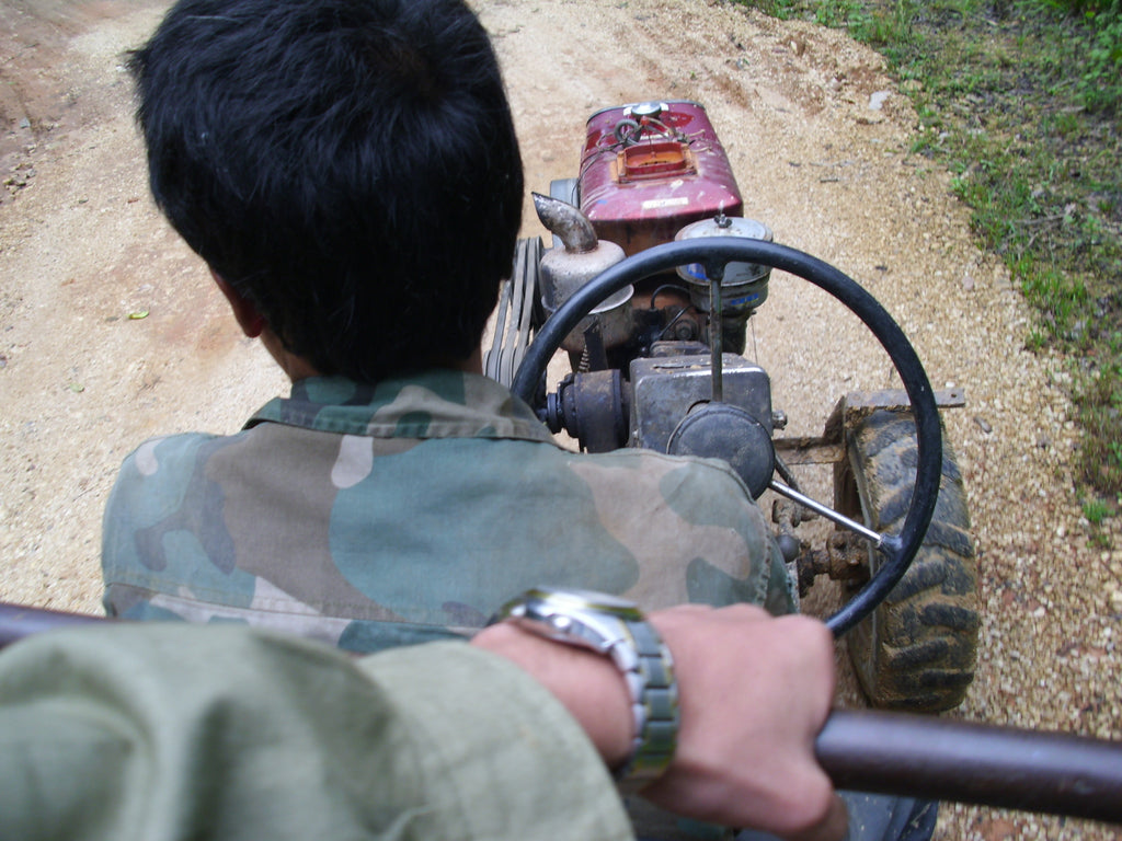 riding on a tractor in yunnan